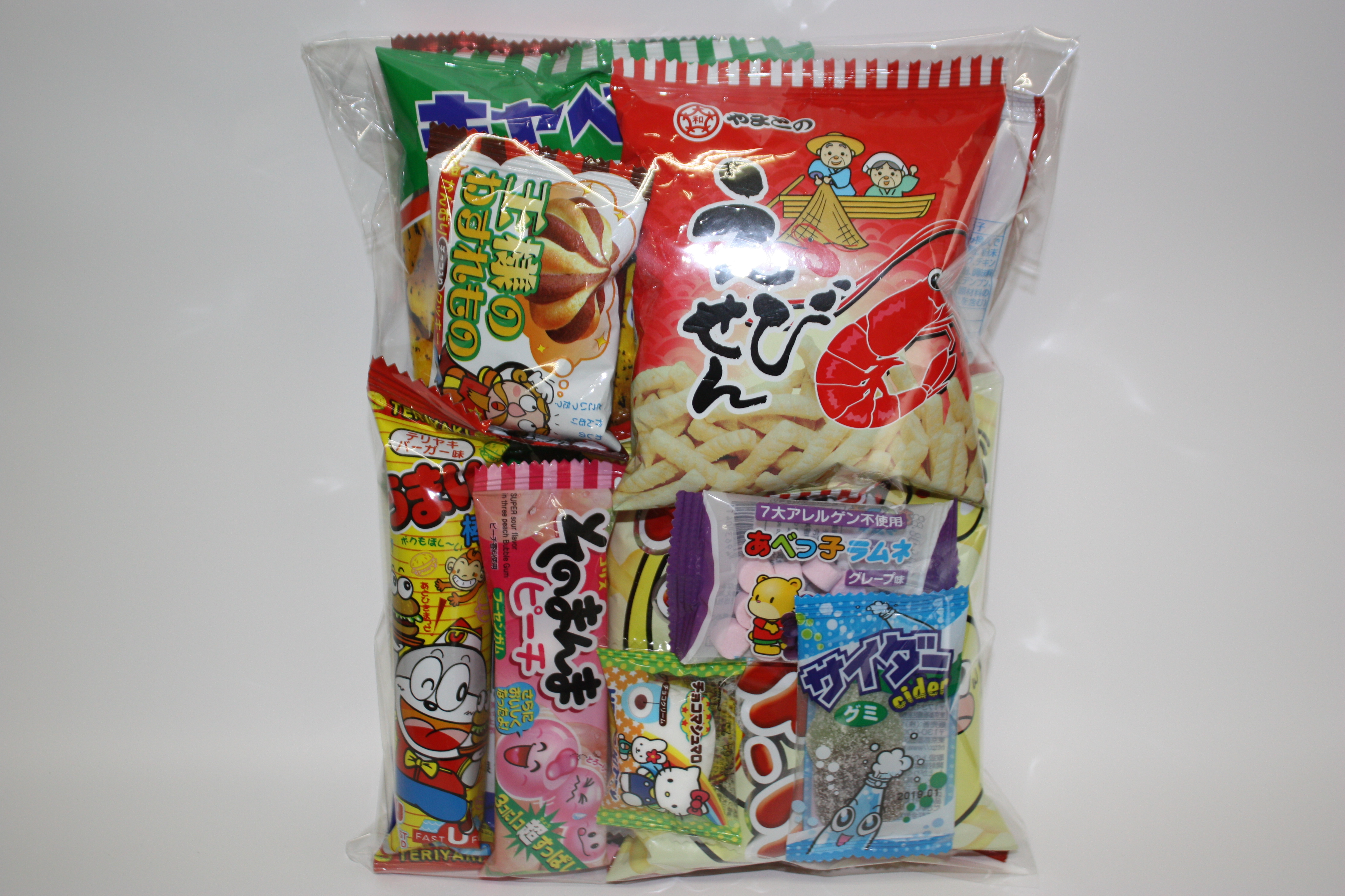 駄菓子 お菓子の袋詰め 吉田玩具店 吉田玩具店は 駄菓子の袋詰めを専門とするショップです